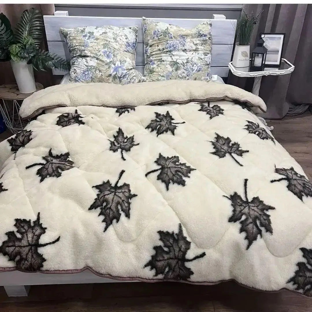 Quilt with maple leaf pattern