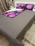 Bedspread with peony patterned pillows